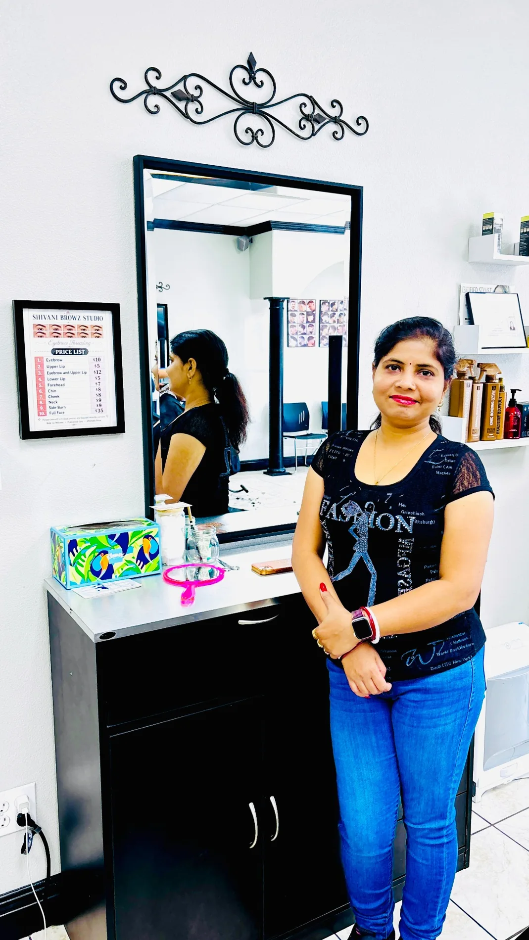 Shivani standing in her beauty studio